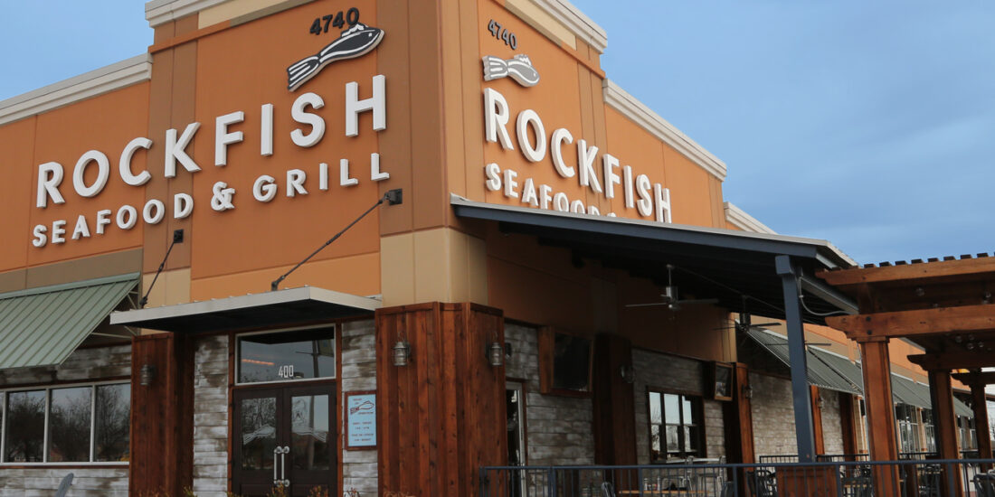 Exterior of Rock Fish restaurant featuring signage and decor with a welcoming coastal-inspired entrance.