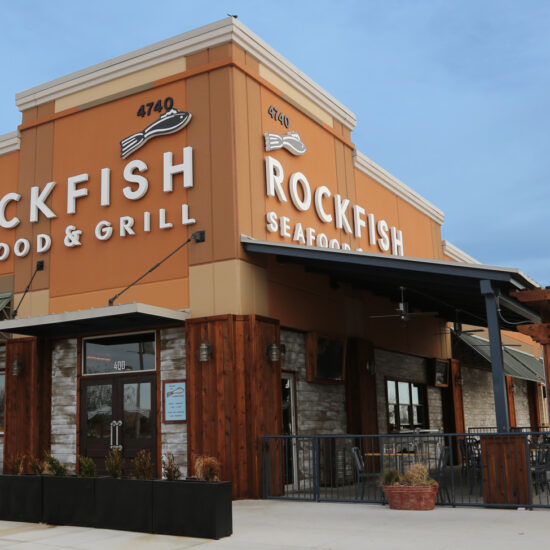 Exterior of Rock Fish restaurant featuring signage and decor with a welcoming coastal-inspired entrance.
