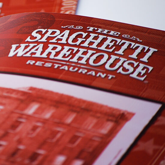 Spaghetti Warehouse menu cover detail photograph featuring a sophisticated typographic treatment.